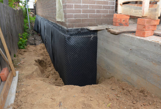 SJ Waterproofing Pros technician performing targeted Waterproofing assessment in Bethel, NC